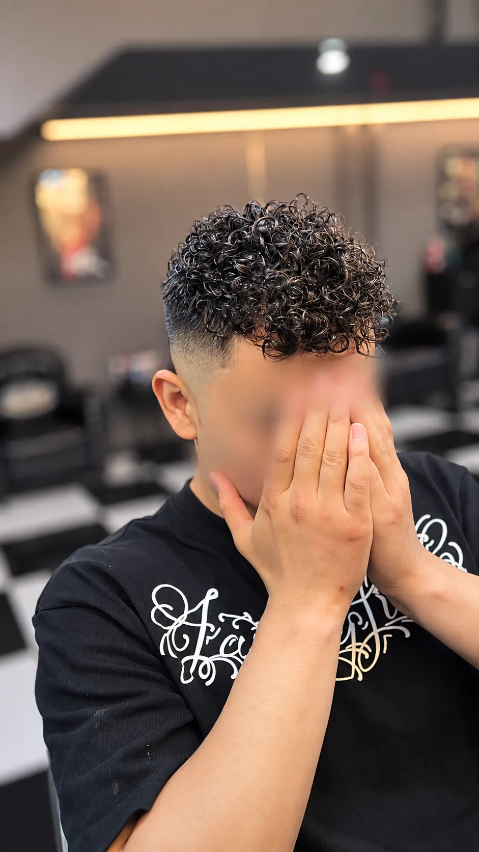 Director Stylist curly perm and fade